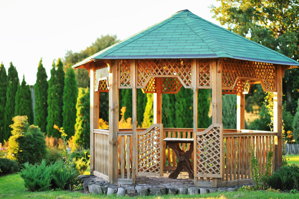 Photo of a gazebo in a garden. 